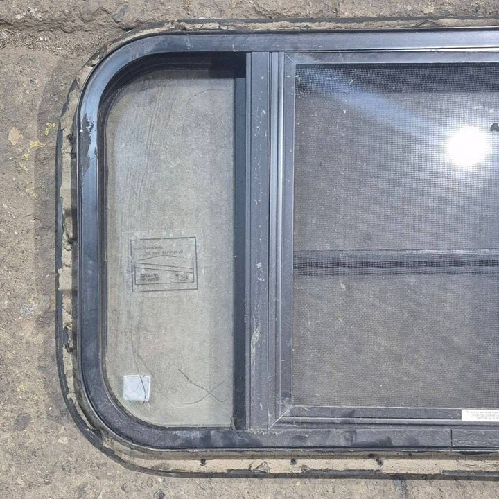 Used Black Radius Opening Window : 23 3/4" X 15" X 1 1/2 - Young Farts RV Parts