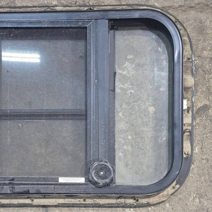 Used Black Radius Opening Window : 23 3/4" X 15" X 1 1/2 - Young Farts RV Parts