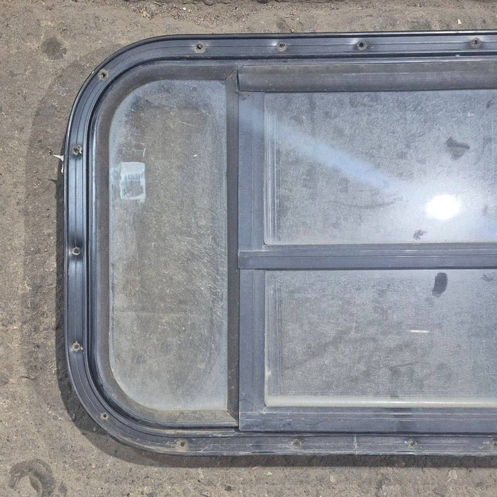 Used Black Radius Opening Window : 23 3/4" X 15" X 1 1/2 - Young Farts RV Parts