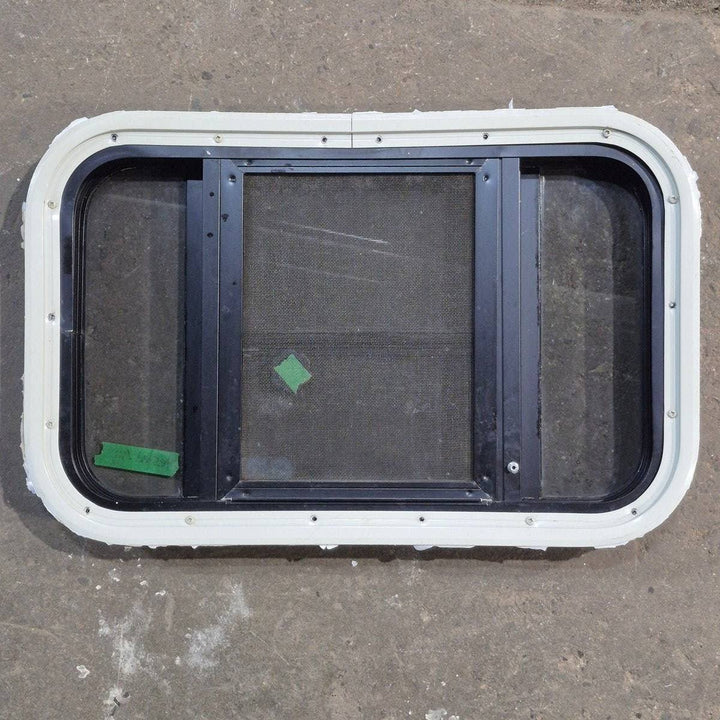 Used Black Radius Opening Window : 23" X 14.25" X 1.875" - Young Farts RV Parts