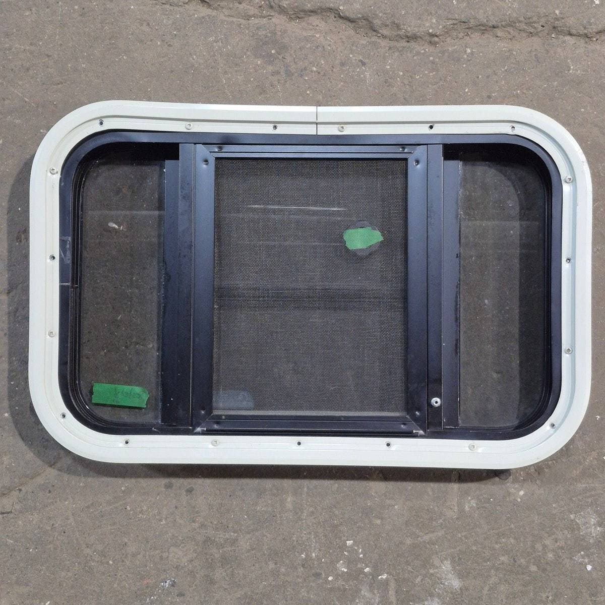 Used Black Radius Opening Window : 23" X 14.25" X 1.875" - Young Farts RV Parts