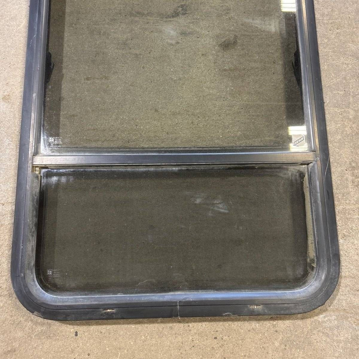 Used Black Radius Opening Window - 23.25 X 34.5 X 1.875 - Young Farts RV Parts