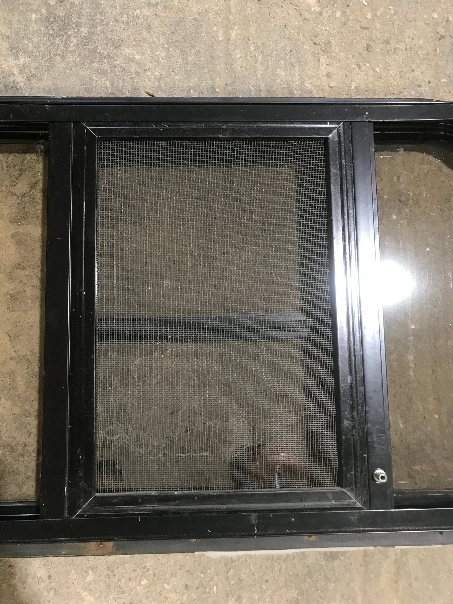 Used Black Radius Opening Window : 24 1/2" W x 16" H x 1 1/2" - Young Farts RV Parts