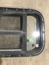 Used Black Radius Opening Window : 24 1/2" W x 16" H x 1 1/2" - Young Farts RV Parts
