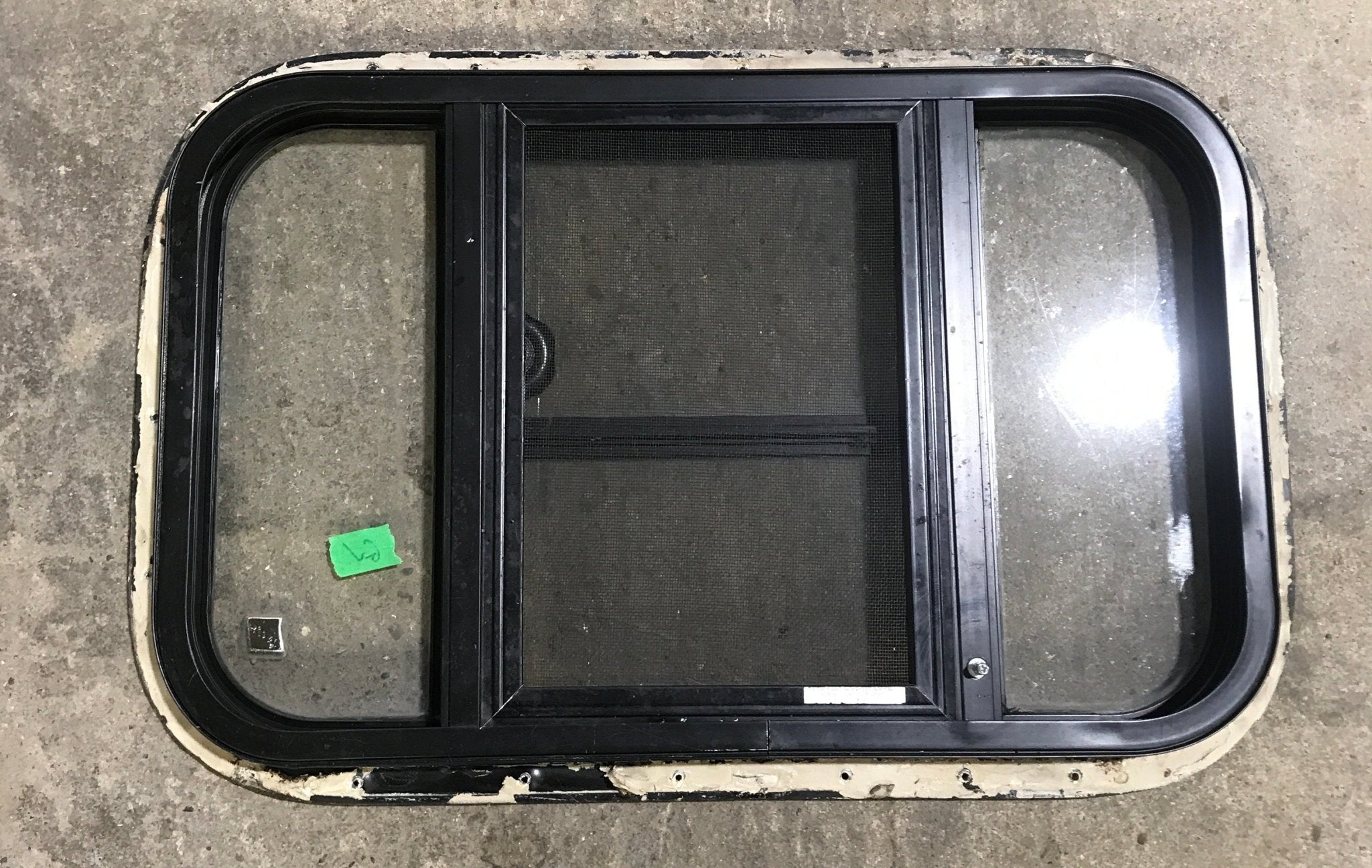 Used Black Radius Opening Window : 24 1/2" W x 16" H x 1 1/2" - Young Farts RV Parts