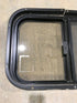Used Black Radius Opening Window : 24 1/2" W x 19 1/4" H x 1 1/4" - Young Farts RV Parts