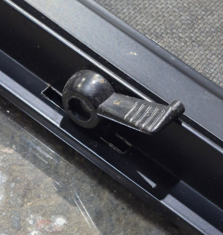 Used Black Radius Opening Window : 24 1/4" W x 17 3/4" H x 1 5/8" D - Young Farts RV Parts