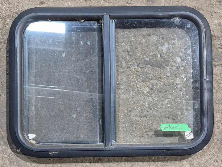 Used Black Radius Opening Window : 24 1/4" W x 17 3/4" H x 1 5/8" D - Young Farts RV Parts