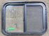 Used Black Radius Opening Window : 24 1/4" W x 17 3/4" H x 1 5/8" D - Young Farts RV Parts