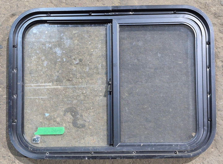 Used Black Radius Opening Window : 24 1/4" W x 17 3/4" H x 1 5/8" D - Young Farts RV Parts