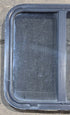 Used Black Radius Opening Window : 24 1/4" W x 21 3/4" H x 1 7/8" - Young Farts RV Parts