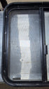 Used Black Radius Opening Window : 24 1/4" W x 25 3/4" H x 1 3/4" - Young Farts RV Parts