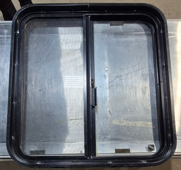 Used Black Radius Opening Window : 24 1/4" W x 25 3/4" H x 1 3/4" - Young Farts RV Parts