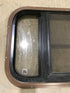 Used Black Radius Opening Window : 24 3/4" W x 15 3/4" H x 1 1/2" D - Young Farts RV Parts