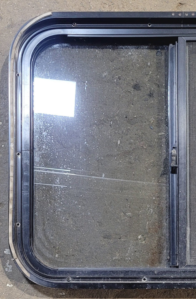 Used Black Radius Opening Window : 25 1/2" W x 20" H x 1 3/4" - Young Farts RV Parts