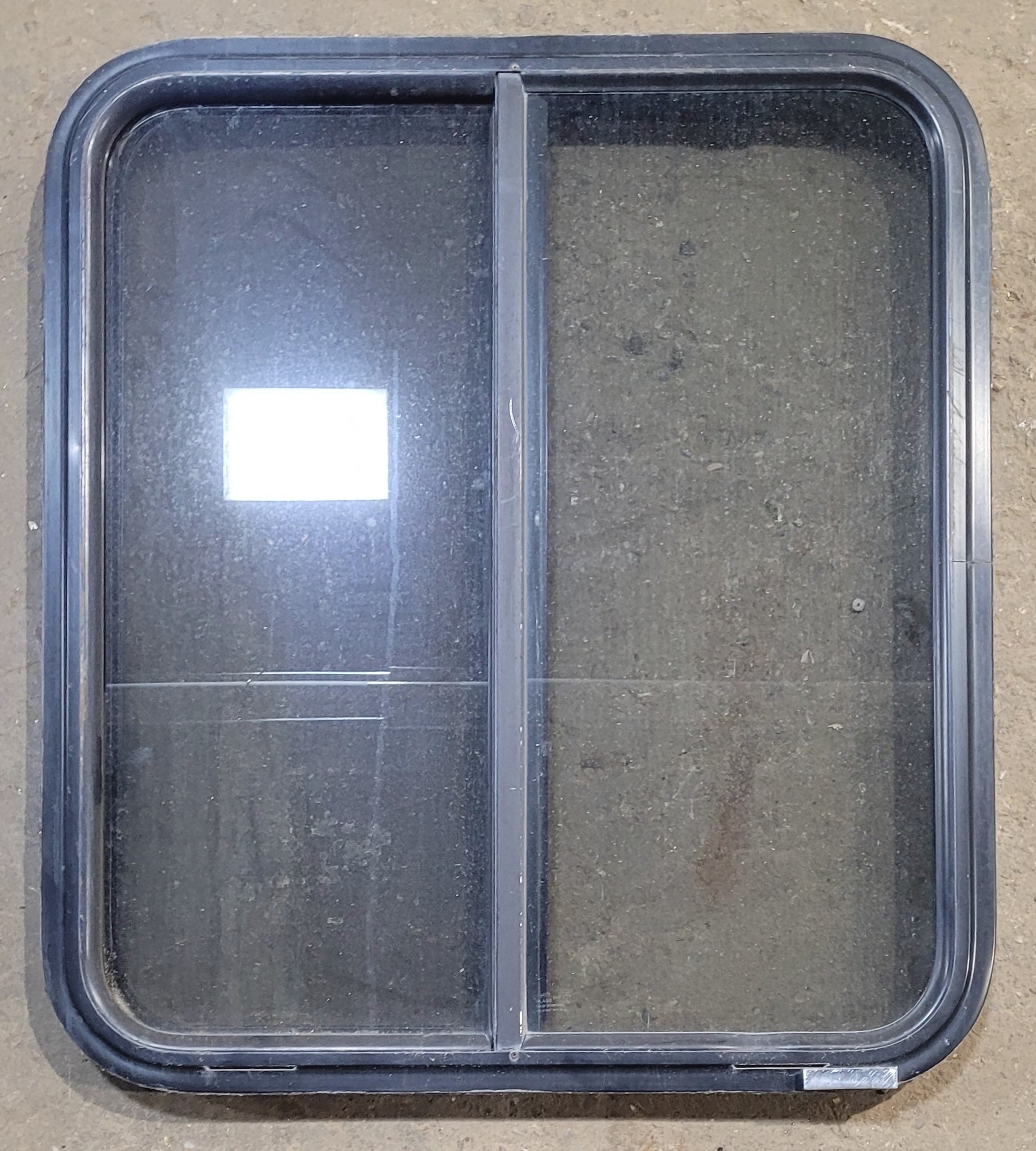 Used Black Radius Opening Window : 25 1/2" W x 28 1/2" H x 1 3/4" - Young Farts RV Parts