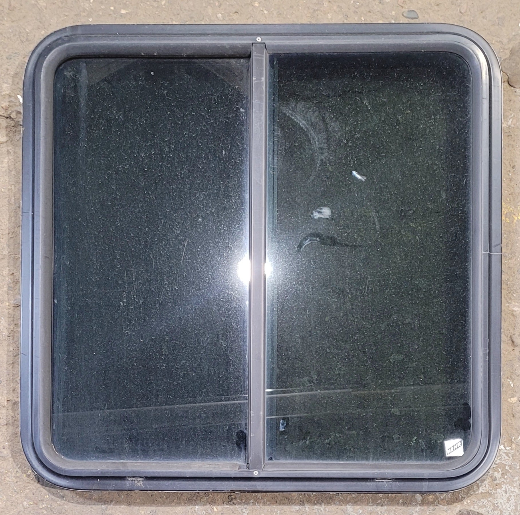 Used Black Radius Opening Window : 25 1/4" W x 24 3/4" H x 1 3/4" - Young Farts RV Parts