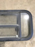 Used Black Radius Opening Window : 29 1/2" W x 14 1/2" H x 2" - Young Farts RV Parts