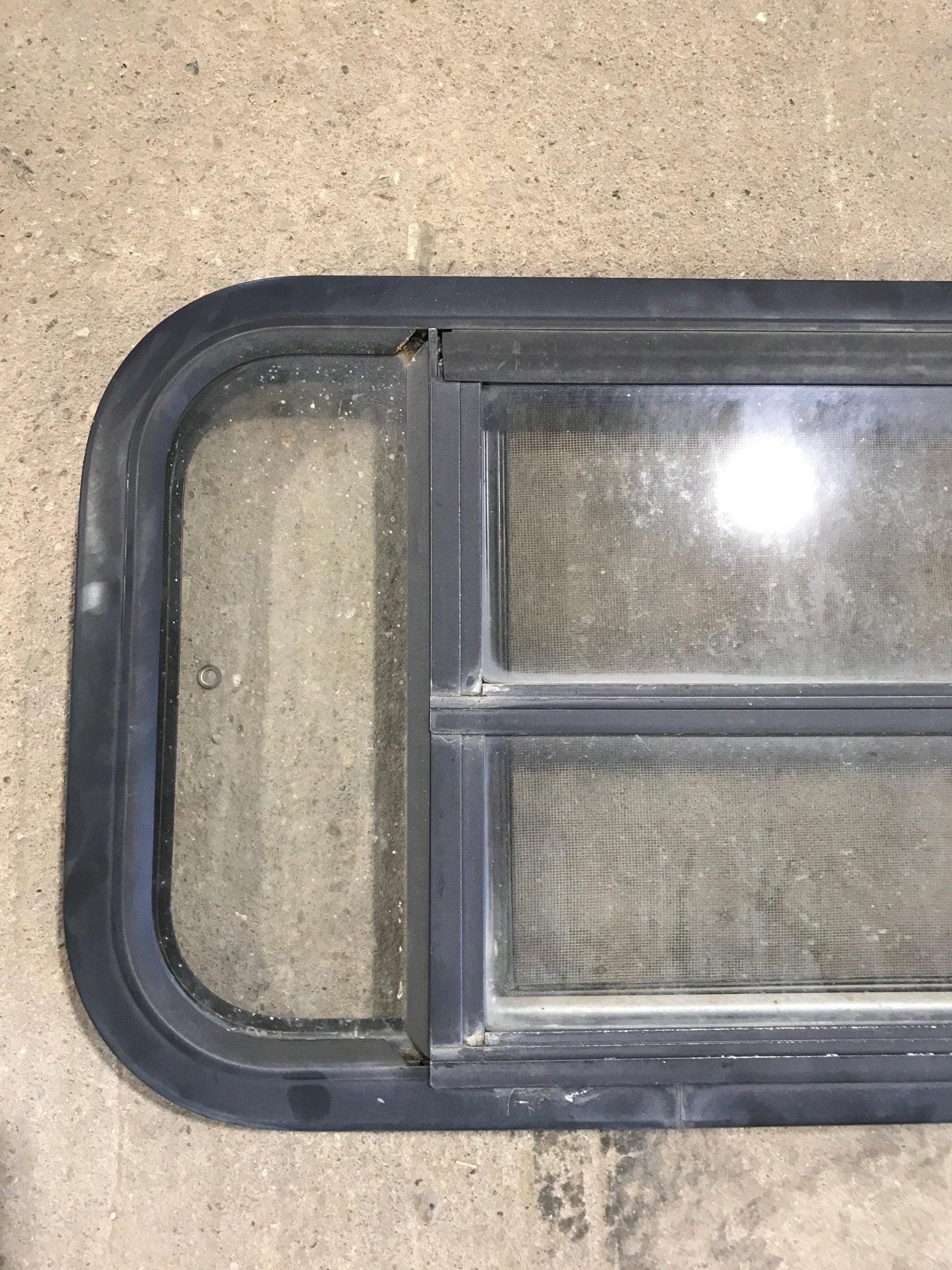 Used Black Radius Opening Window : 29 1/2" W x 14 1/2" H x 2" - Young Farts RV Parts