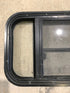Used Black Radius Opening Window : 29 1/2" W x 14 1/2" H x 2" - Young Farts RV Parts