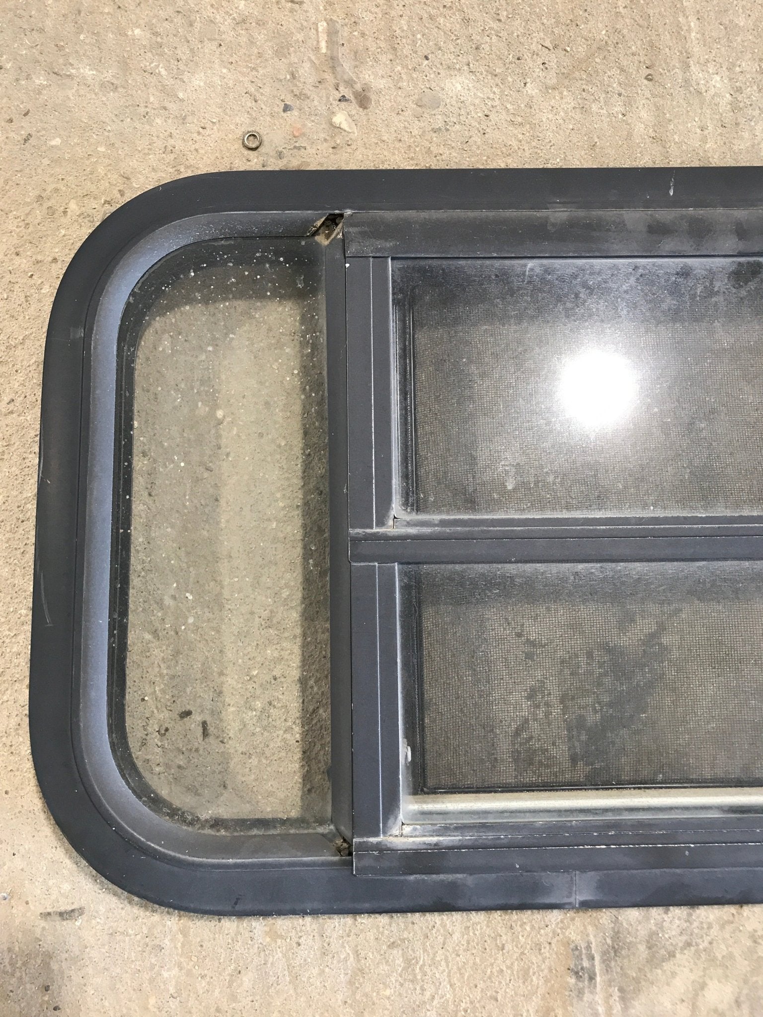 Used Black Radius Opening Window : 29 1/2" W x 14 1/2" H x 2" - Young Farts RV Parts