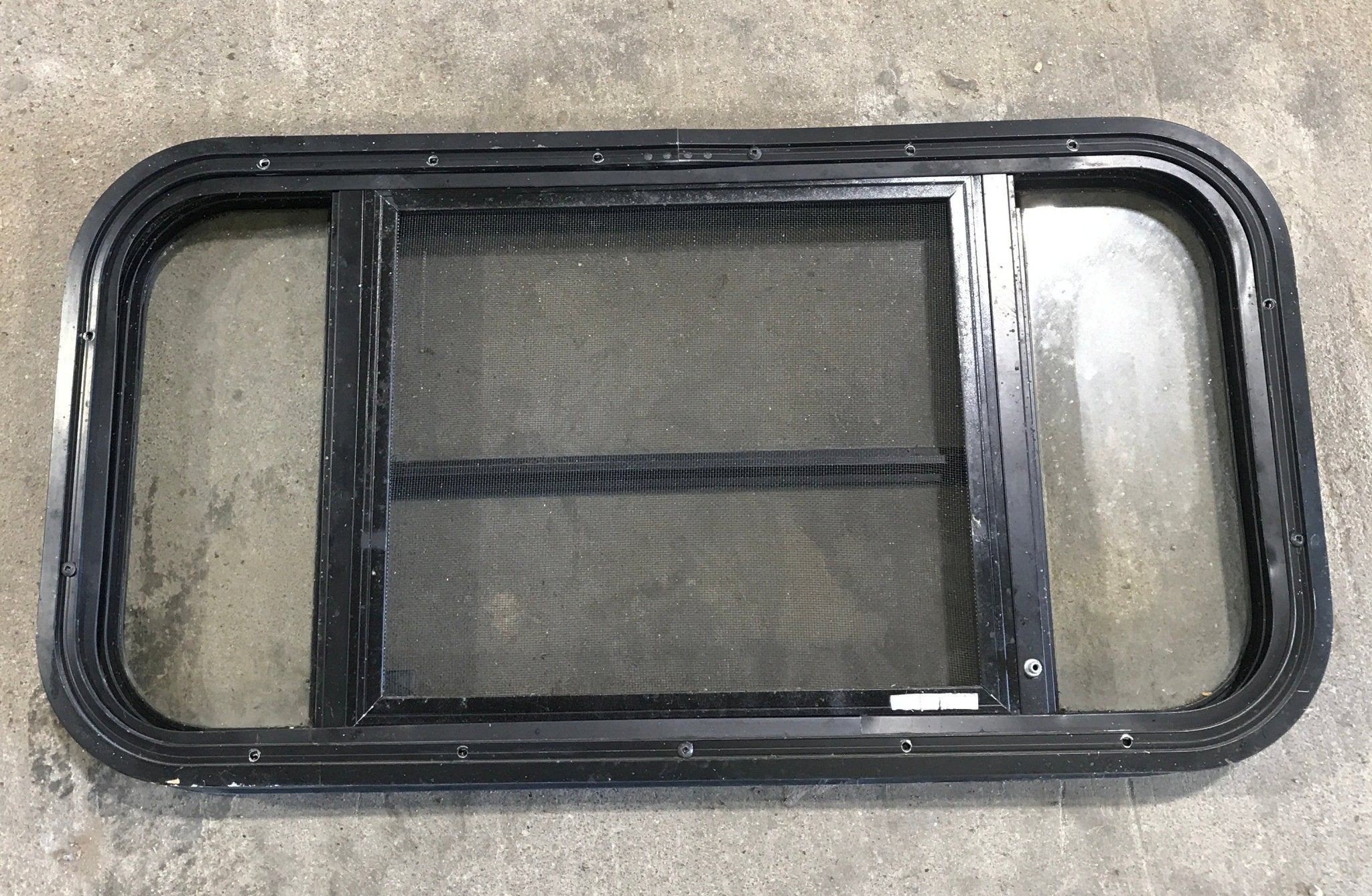 Used Black Radius Opening Window : 29 1/2" W x 14 1/2" H x 2" - Young Farts RV Parts