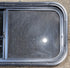Used Black Radius Opening Window : 29 1/2" W x 14 1/4" H x 1 1/4" - Young Farts RV Parts