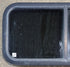 Used Black Radius Opening Window : 29 1/2" W x 14 1/4" H x 1 1/4" - Young Farts RV Parts