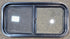 Used Black Radius Opening Window : 29 1/2" W x 14 3/4" H x 1 7/8" - Young Farts RV Parts