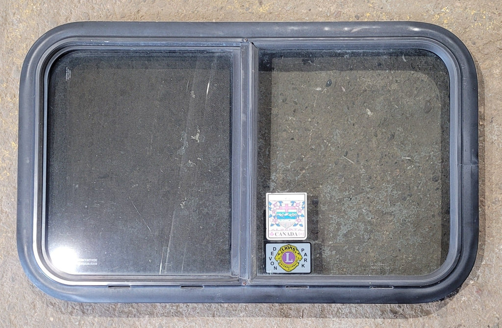 Used Black Radius Opening Window : 29 1/2" W x 17 1/2" H x 1 7/8" D - Young Farts RV Parts