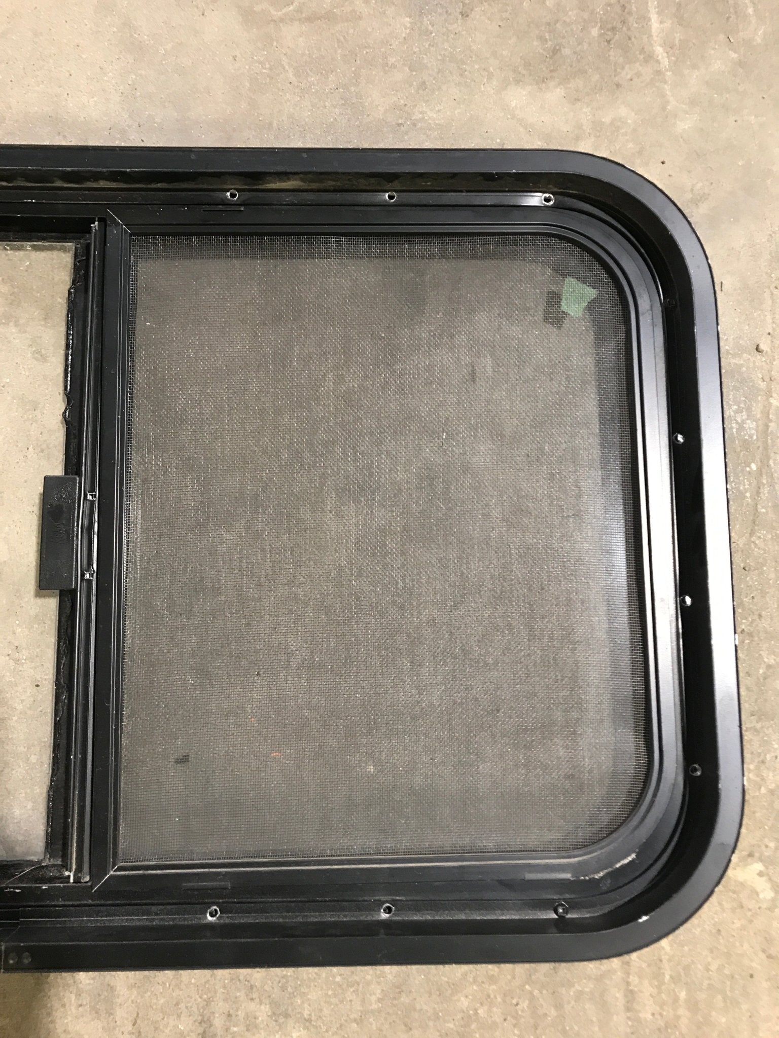 Used Black Radius Opening Window : 29 1/2" W x 17 1/2" H x 2" D - Young Farts RV Parts