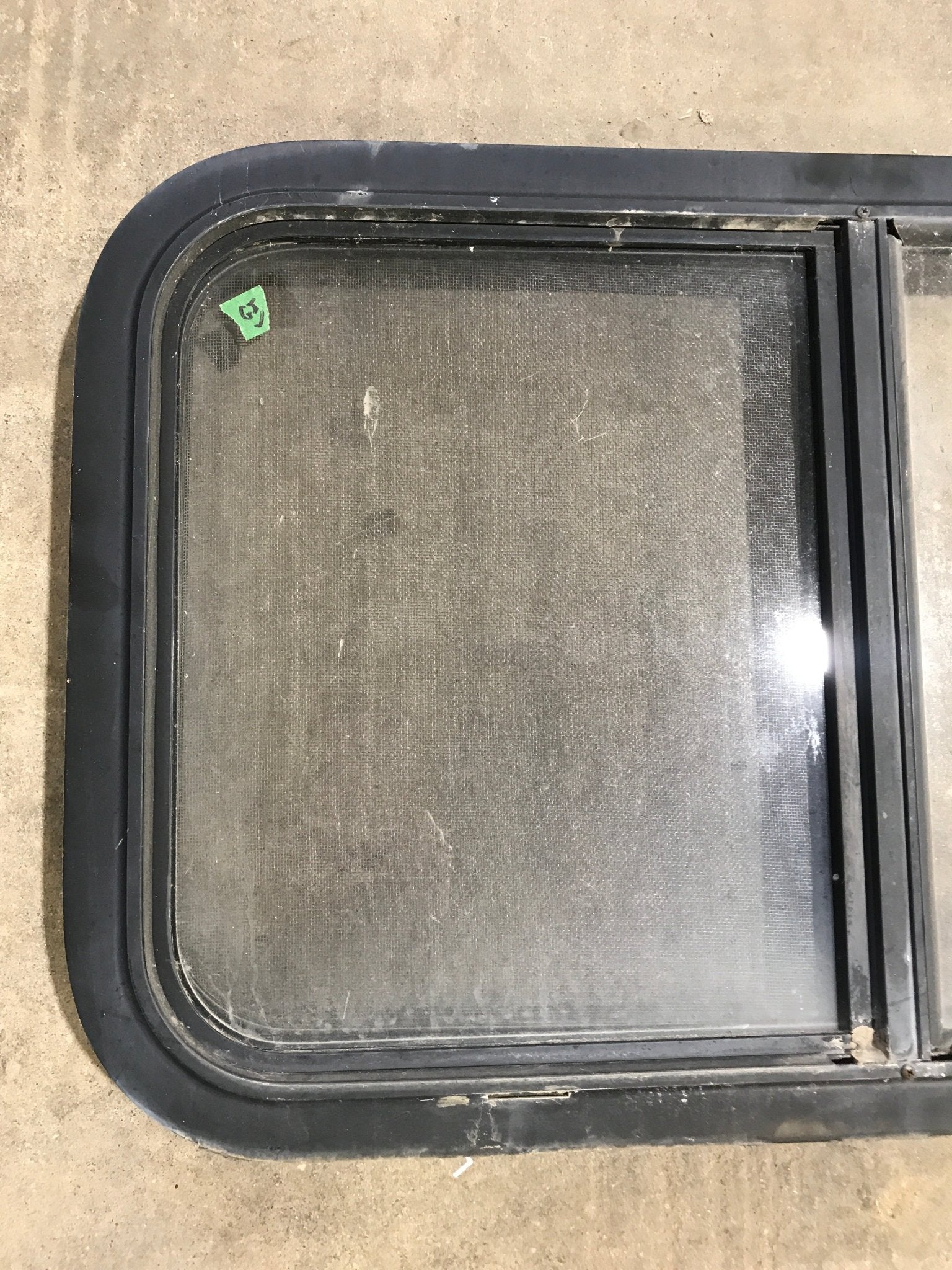 Used Black Radius Opening Window : 29 1/2" W x 17 1/2" H x 2" D - Young Farts RV Parts