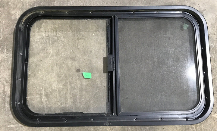 Used Black Radius Opening Window : 29 1/2" W x 17 1/2" H x 2" D - Young Farts RV Parts