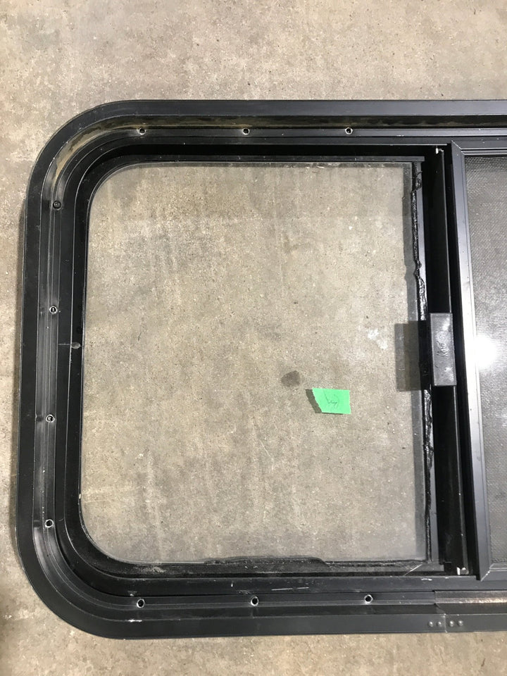 Used Black Radius Opening Window : 29 1/2" W x 17 1/2" H x 2" D - Young Farts RV Parts