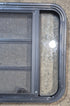 Used Black Radius Opening Window : 29 1/2" W x 22 1/2" H x 1 3/4" - Young Farts RV Parts