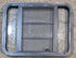 Used Black Radius Opening Window : 29 1/2" W x 22 1/2" H x 1 3/4" - Young Farts RV Parts