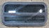 Used Black Radius Opening Window : 29 1/4" W x 14 1/4" H x 1 3/4" - Young Farts RV Parts