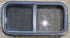 Used Black Radius Opening Window : 29 1/4" W x 14 1/4" H x 1 3/4" - Young Farts RV Parts