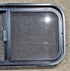 Used Black Radius Opening Window : 29 1/4" W x 14 1/4" H x 1 3/4" - Young Farts RV Parts