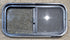 Used Black Radius Opening Window : 29 1/4" W x 14 1/4" H x 1 3/4" - Young Farts RV Parts