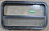 Used Black Radius Opening Window : 29 1/4" W x 17 1/2" H x 1 7/8" D - Young Farts RV Parts