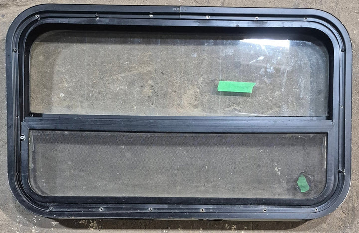 Used Black Radius Opening Window : 29 1/4" W x 17 1/2" H x 1 7/8" D - Young Farts RV Parts