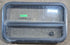 Used Black Radius Opening Window : 29 1/4" W x 17 1/2" H x 1 7/8" D - Young Farts RV Parts