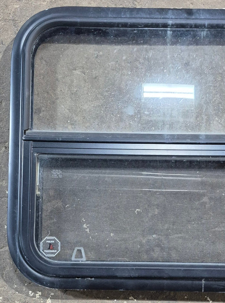 Used Black Radius Opening Window : 29 1/4" W x 21 1/4" H x 1 1/4" D - Young Farts RV Parts
