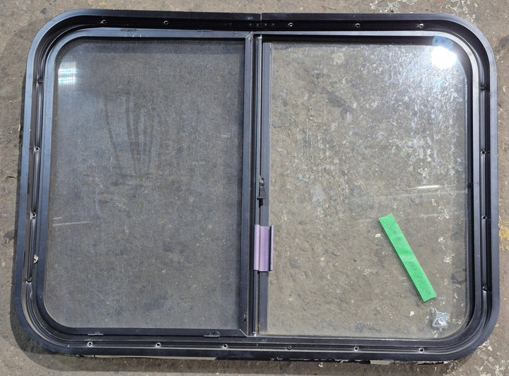 Used Black Radius Opening Window : 29 1/4" W x 21 1/4" H x 1 3/4" D - Young Farts RV Parts