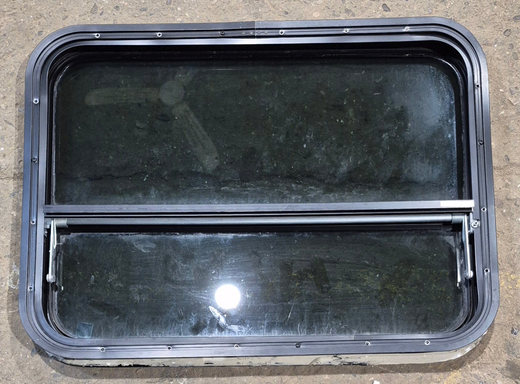 Used Black Radius Opening Window : 29 1/4" W x 21 1/4" H x 2" - Young Farts RV Parts