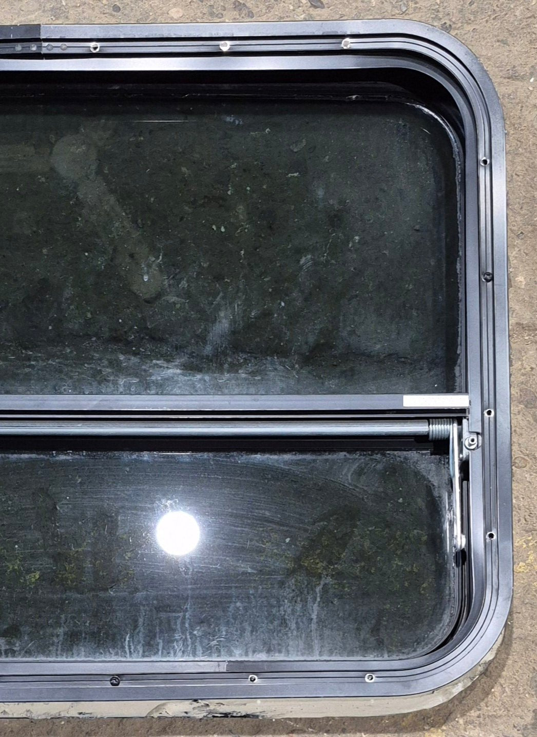 Used Black Radius Opening Window : 29 1/4" W x 21 1/4" H x 2" - Young Farts RV Parts
