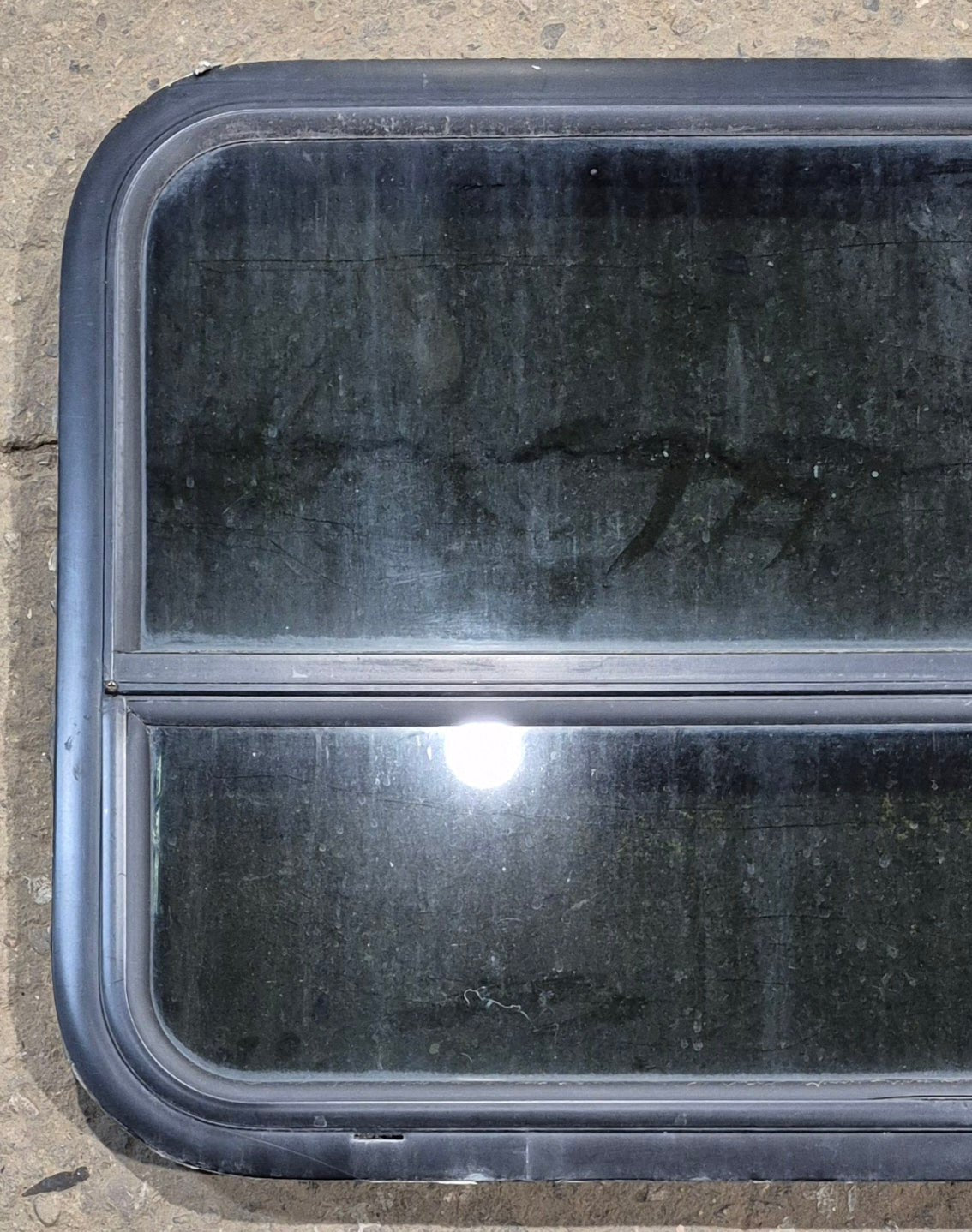 Used Black Radius Opening Window : 29 1/4" W x 21 1/4" H x 2" - Young Farts RV Parts