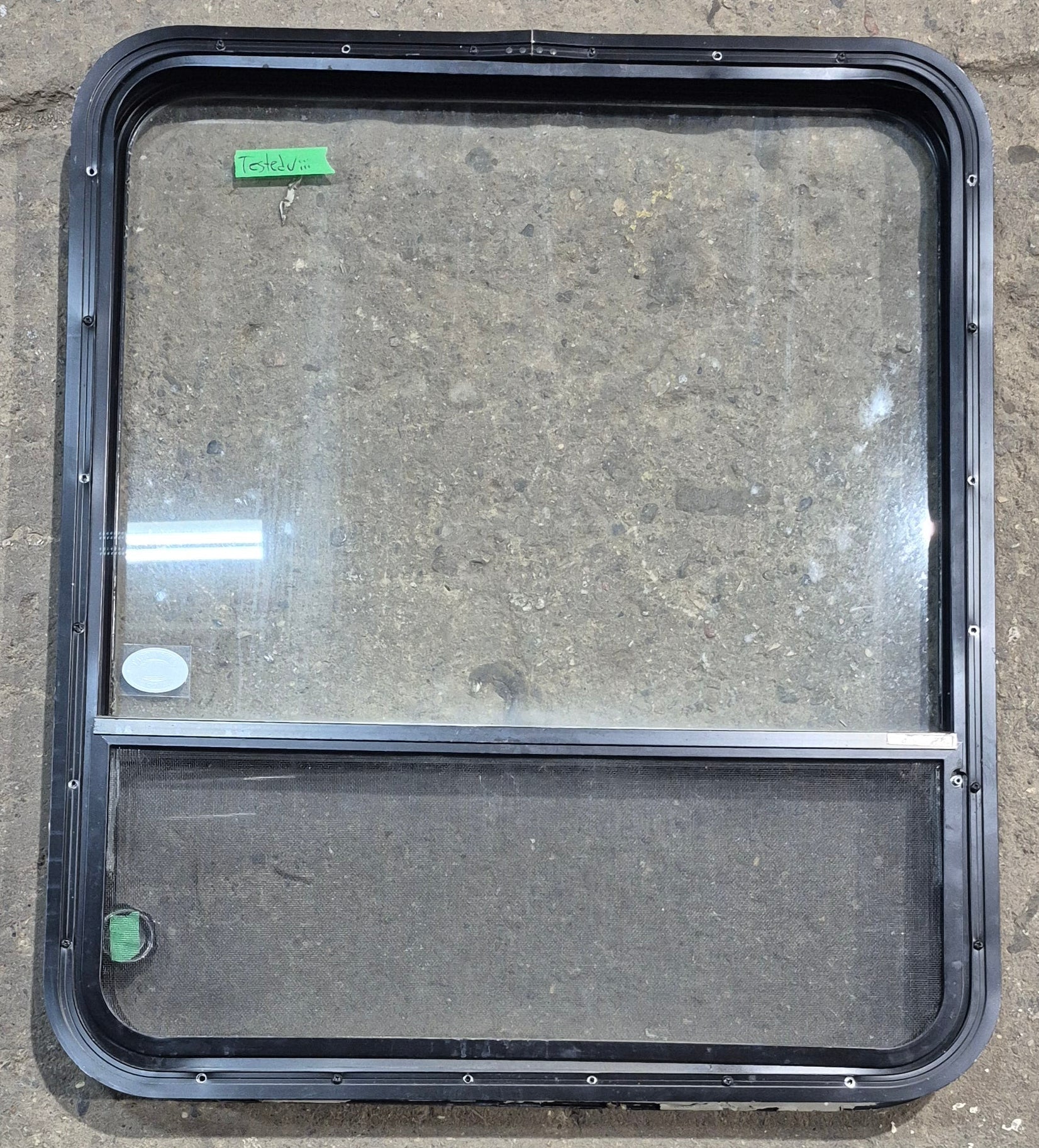 Used Black Radius Opening Window : 29 1/4" W x 34 1/2" H x 1 7/8" D - Young Farts RV Parts