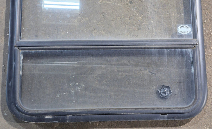 Used Black Radius Opening Window : 29 1/4" W x 34 1/2" H x 1 7/8" D - Young Farts RV Parts